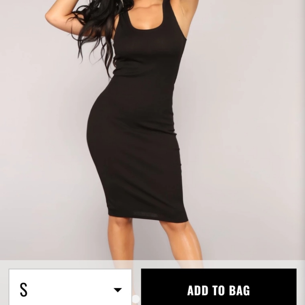 All black fitted dress with lace on the back